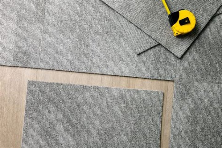 Can carpet be laid over linoleum