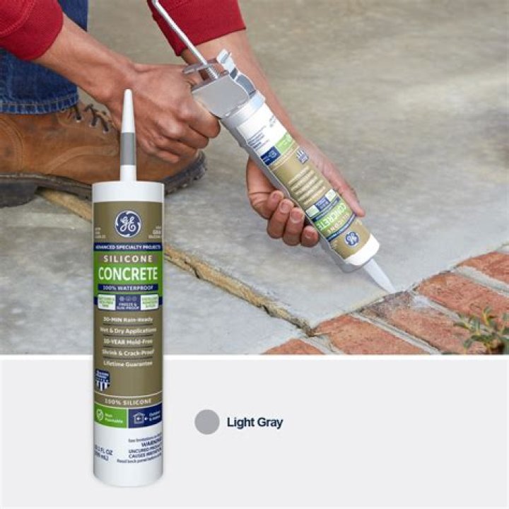 Can you caulk over existing grout