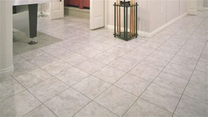 Can you put ceramic tile on concrete basement floor