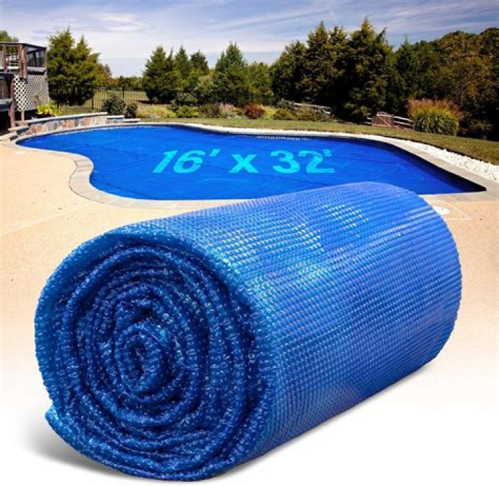 Do solar pool covers heat the water