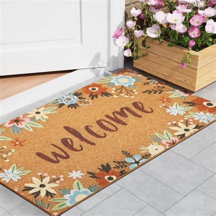 Do welcome mats go inside or outside