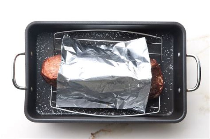 Do you cover a roast with foil in the oven