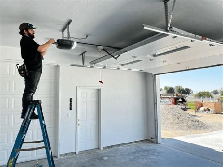 How do I keep water out of my garage door