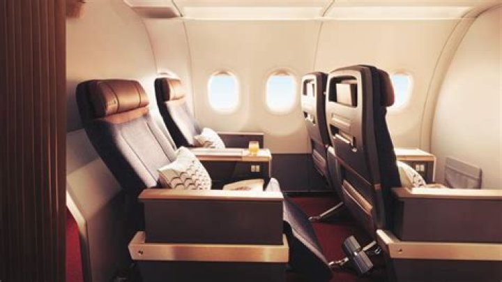 How do I upgrade to business class on Air China