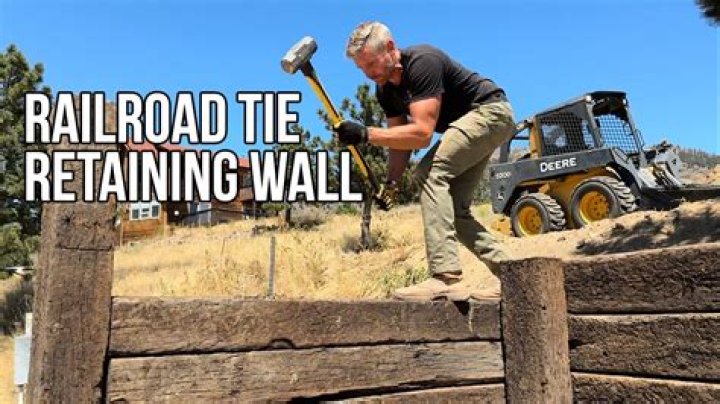 How do you build a railroad tie retaining wall on a slope
