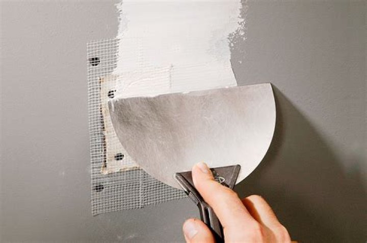 How do you cover up wall patches