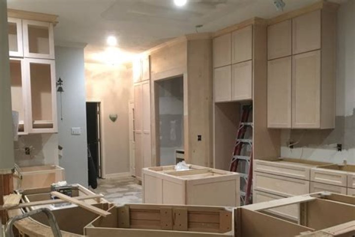 How do you distress unfinished cabinets