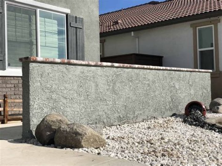 How do you finish rough concrete walls