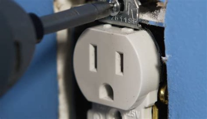 How do you fix a loose electrical outlet box