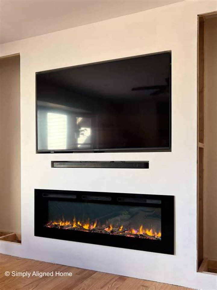How do you install an electric fireplace insert in an existing gas fireplace