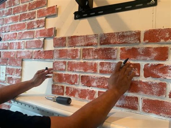 How do you paint faux bricks on concrete