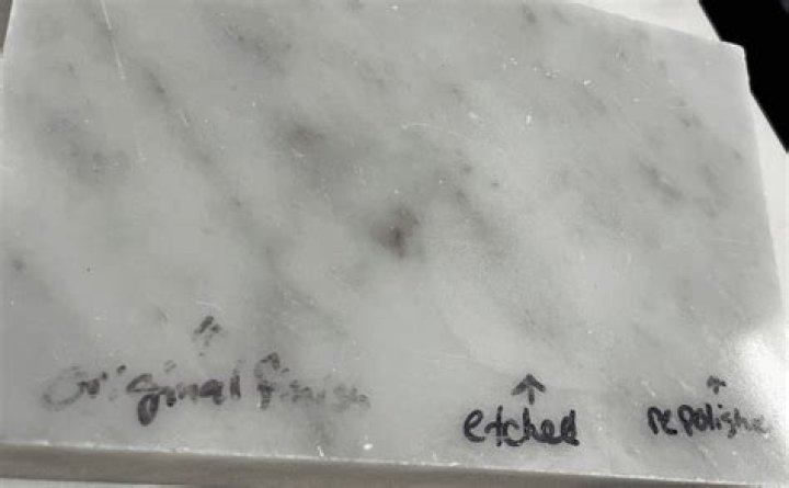 How do you refinish etched marble