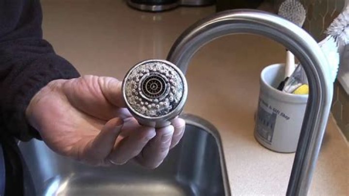 How do you remove tarnish from a stainless steel faucet