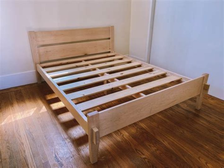 How do you stabilize a wooden bed frame