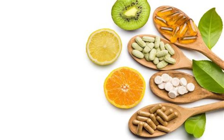 How do you take vitamins with food