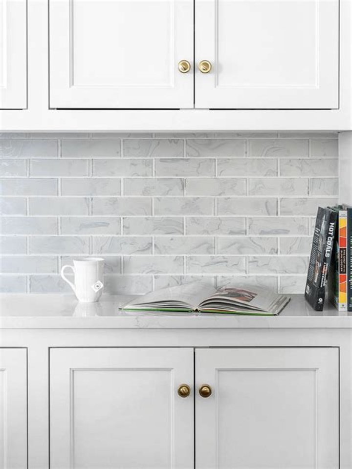 How far up should a backsplash go