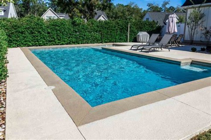 How much does a stamped concrete pool deck cost