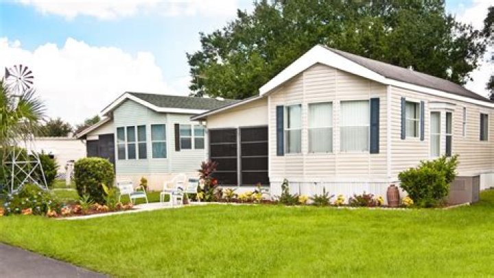 How much does it cost to Sheetrock an entire house
