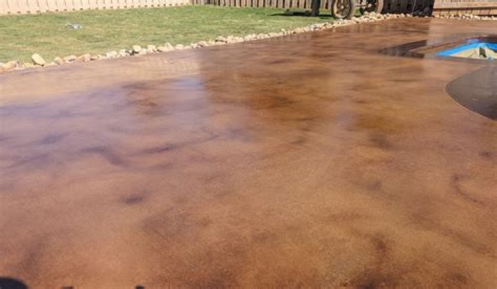 Is concrete stain better than paint