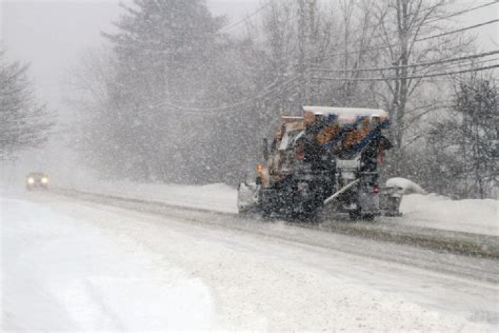 Is it legal to plow snow across the road in Wisconsin