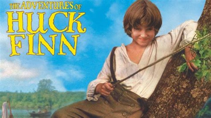 What are some major themes in Huckleberry Finn