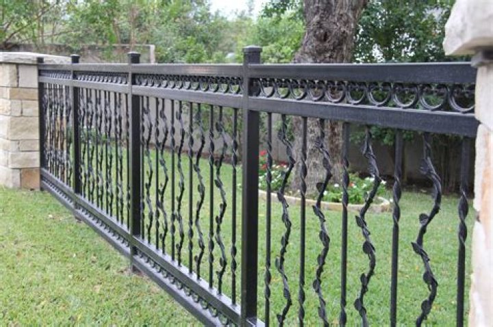 What are the parts of a wrought iron fence called