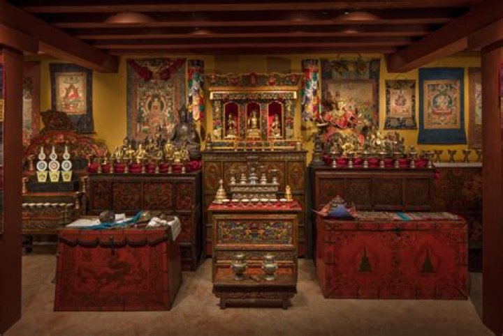 What do flowers represent in a Buddhist shrine
