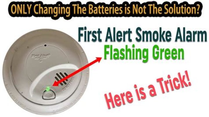 What does a blinking green light on a First Alert smoke detector mean