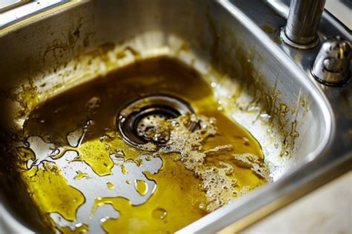 What happens when you pour hot oil down the sink