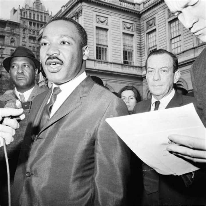 What important event resulted from a collaboration between Dr Martin Luther King and a Philip Randolph