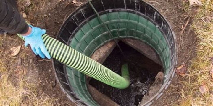 What is a riser for a septic tank