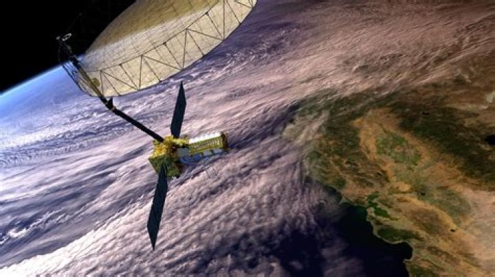 What keeps a satellite from falling to Earth