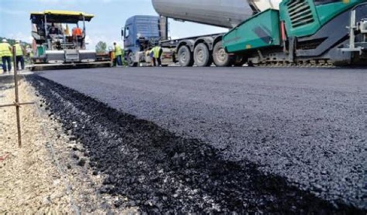 What weighs more asphalt or concrete