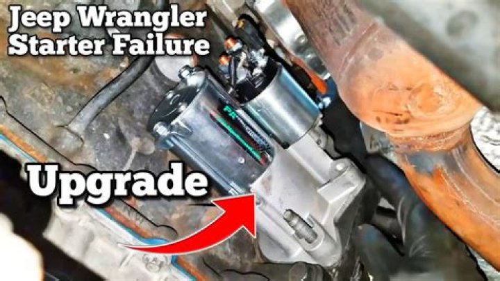 Where is the starter located in a Jeep Liberty