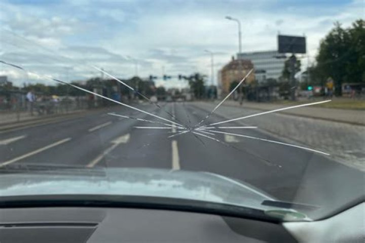 Who is responsible for rock hitting windshield