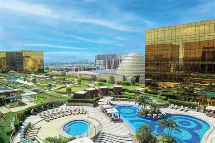 Who is the owner of City of Dreams Manila