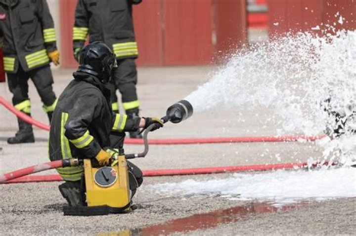 Why do firefighters use foam instead of water