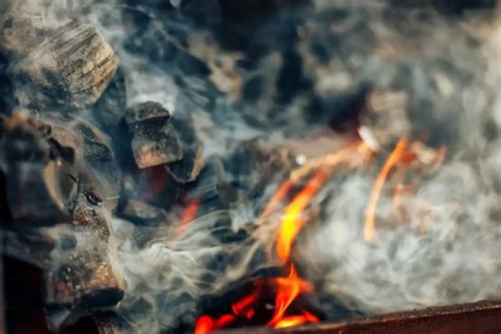 Why does my fireplace smell like smoke when it rains