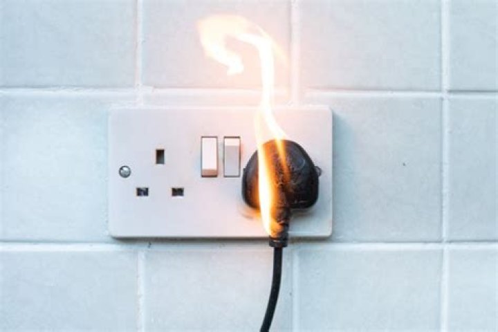 Why would an electrical outlet caught fire